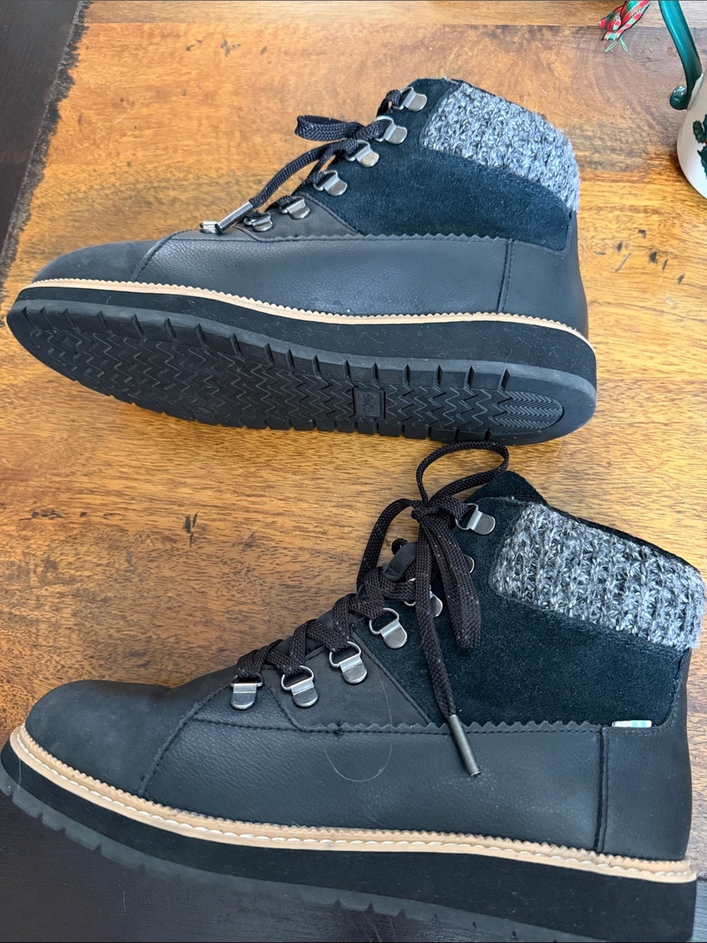 Tom’s Mesa ankle boots size 7 black with grey wool ankle rim as new condition.